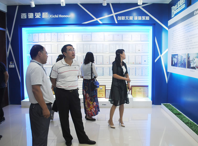 西安名牌產(chǎn)品復審與質量專家走進西馳(圖2)